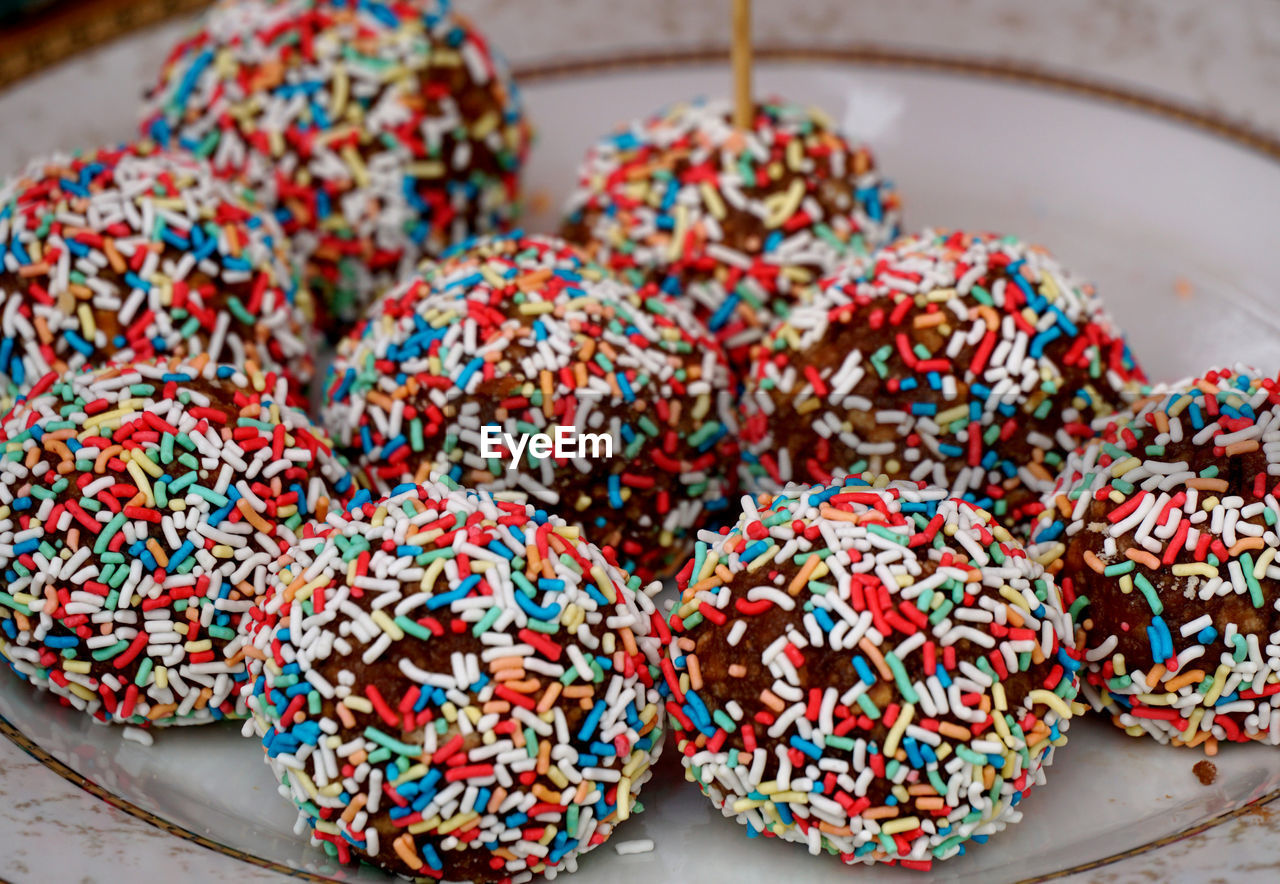 Homemade chocolate balls coated with sprinkles