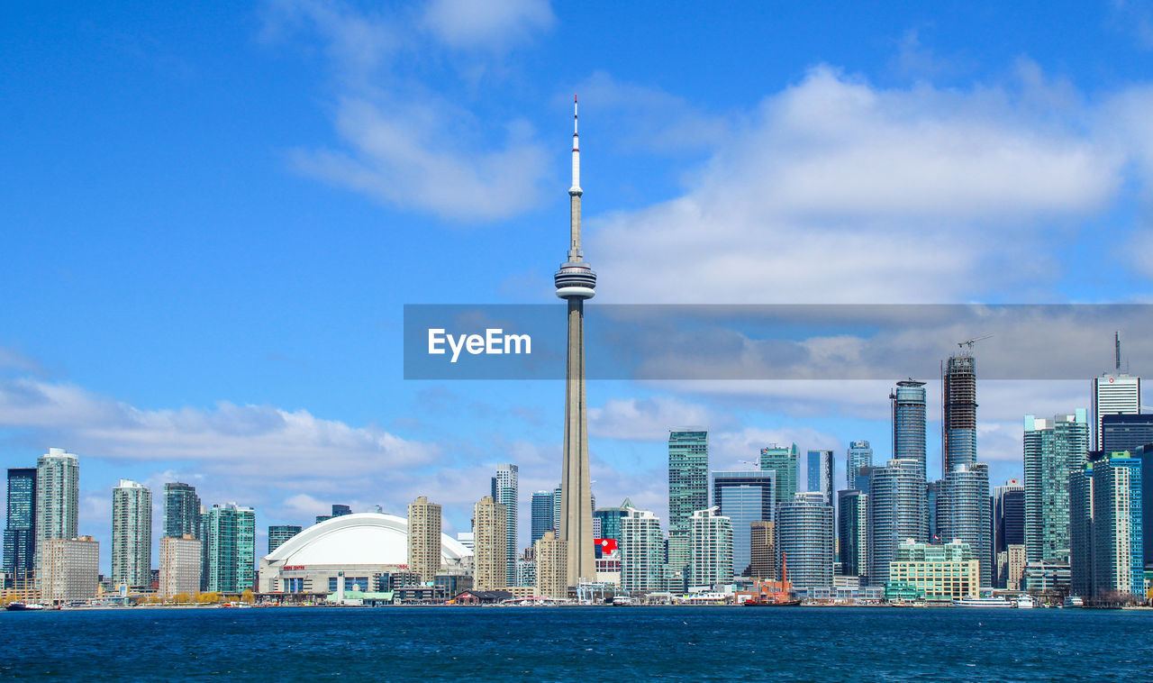 Toronto cityscape against cloudy sky