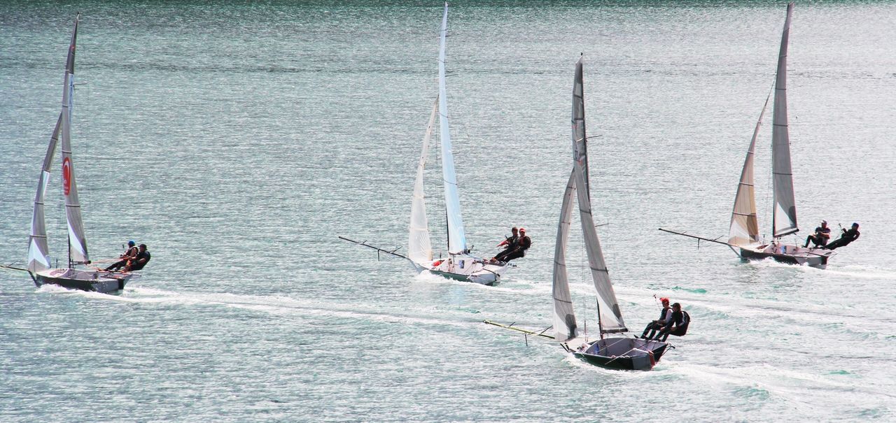 Sailboats racing on sea