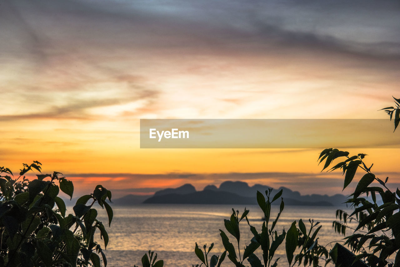 Scenic view of sea against sky during sunset