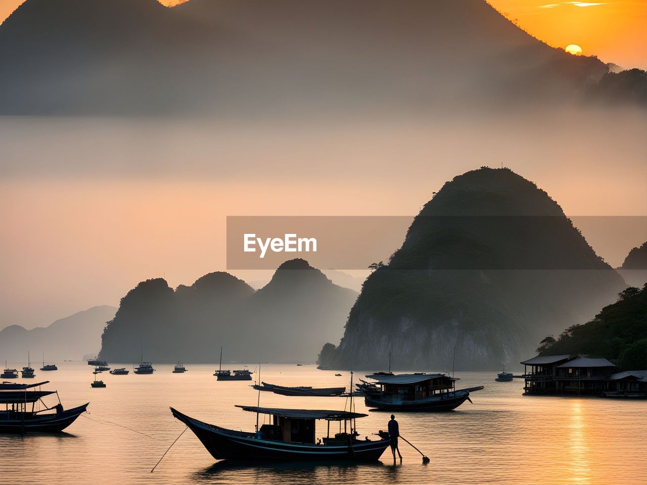 scenic view of silhouette mountains against sky during sunset