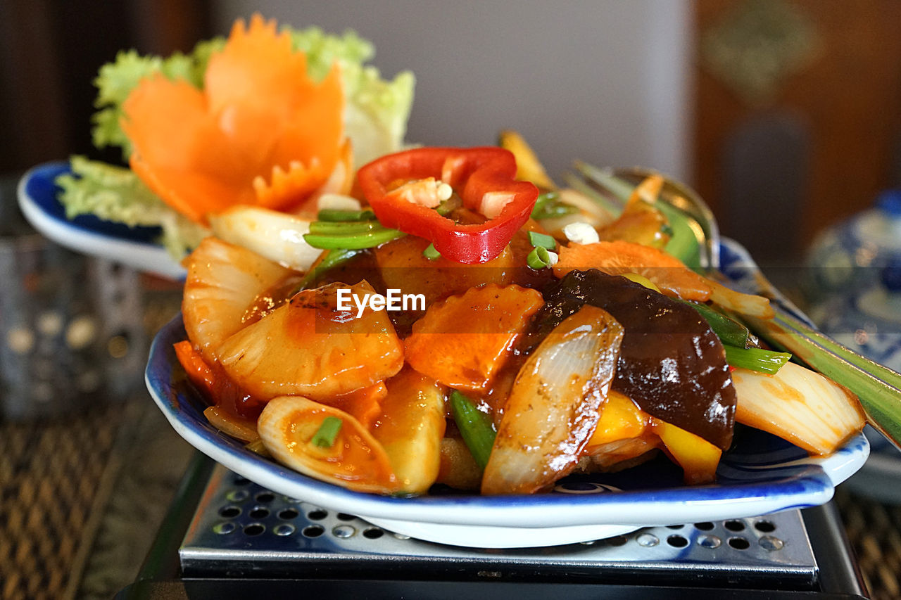 Close-up of fruit salad in plate on table