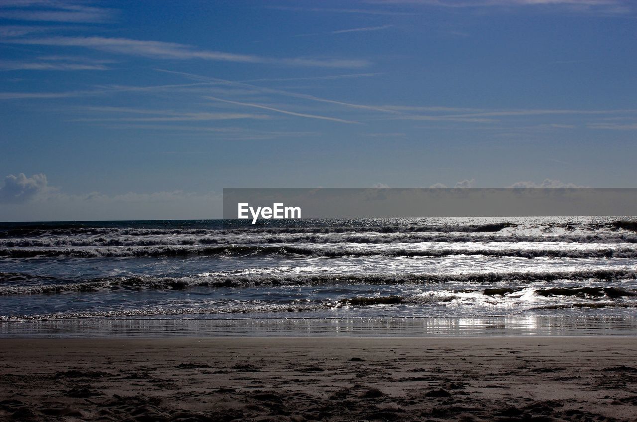 Scenic view of beach against sky