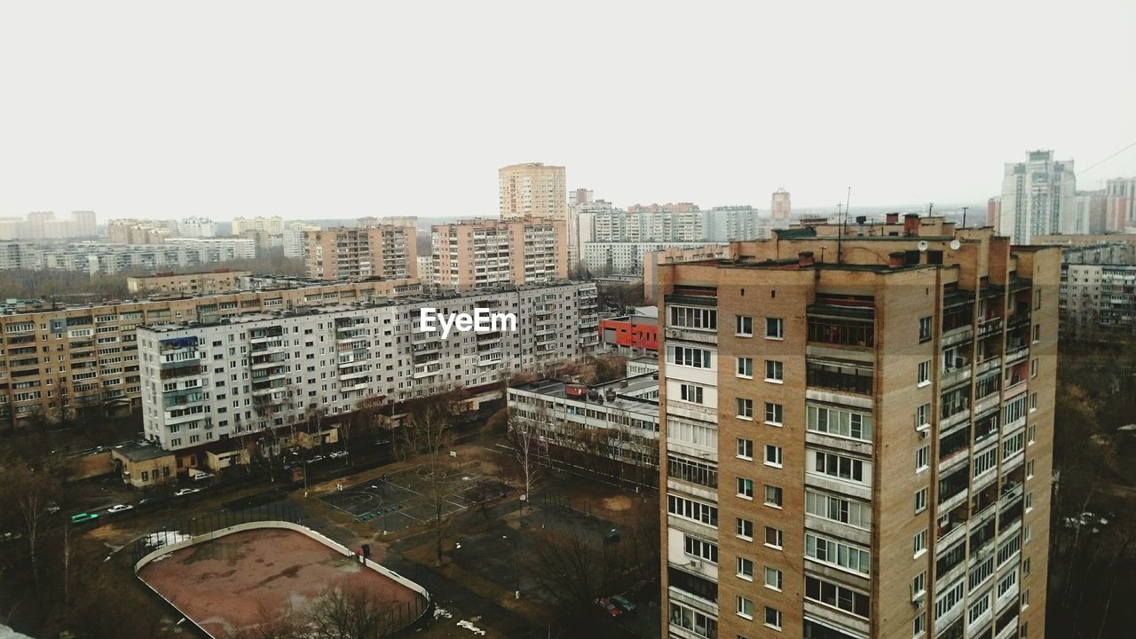 High angle view of buildings against clear sky