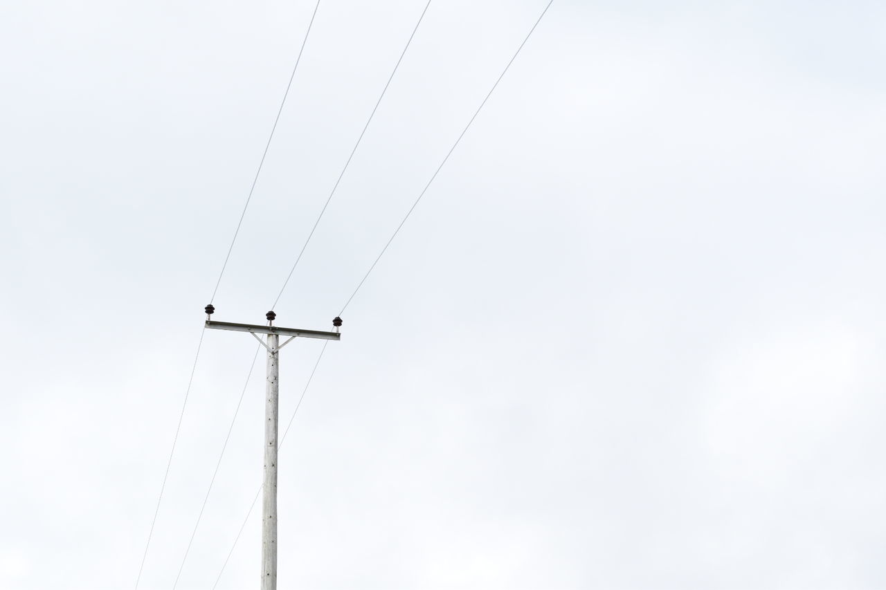 LOW ANGLE VIEW OF ELECTRICITY PYLON