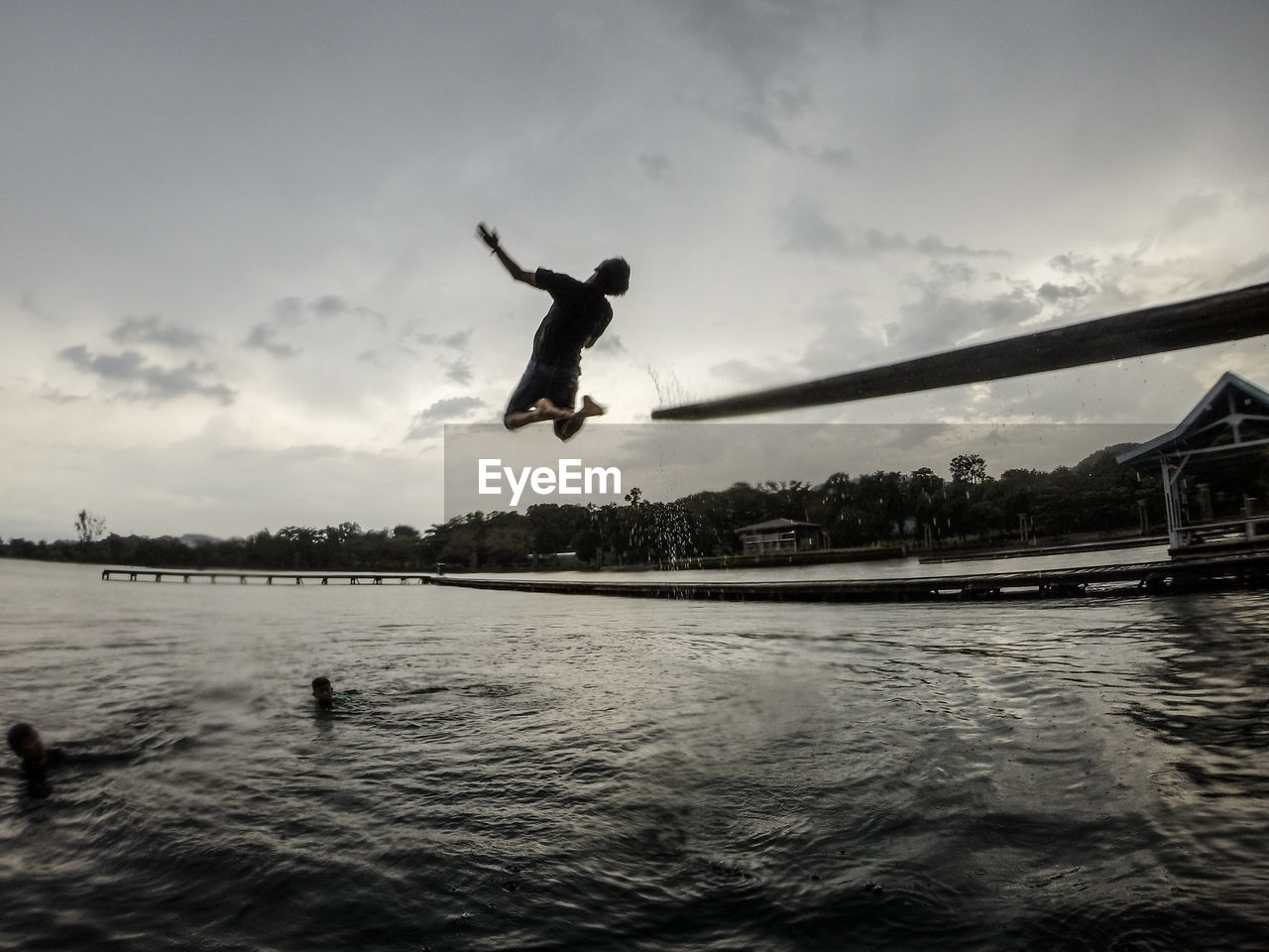 Full length of man jumping in sea