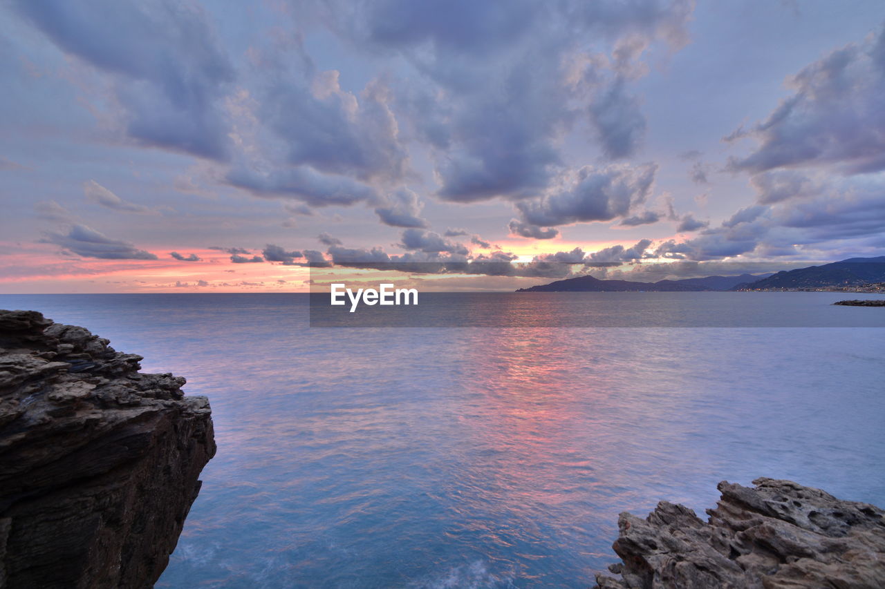 Scenic view of sea against sky during sunset