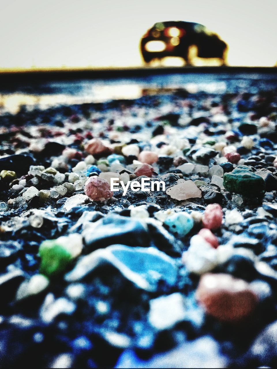 CLOSE-UP OF PEBBLES IN PEBBLE