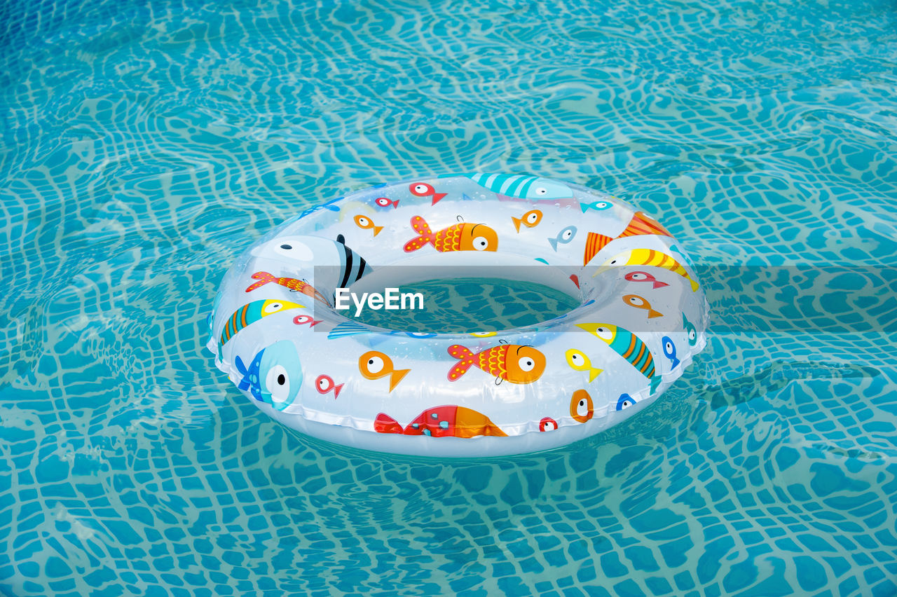 High angle view of inflatable ring in swimming pool