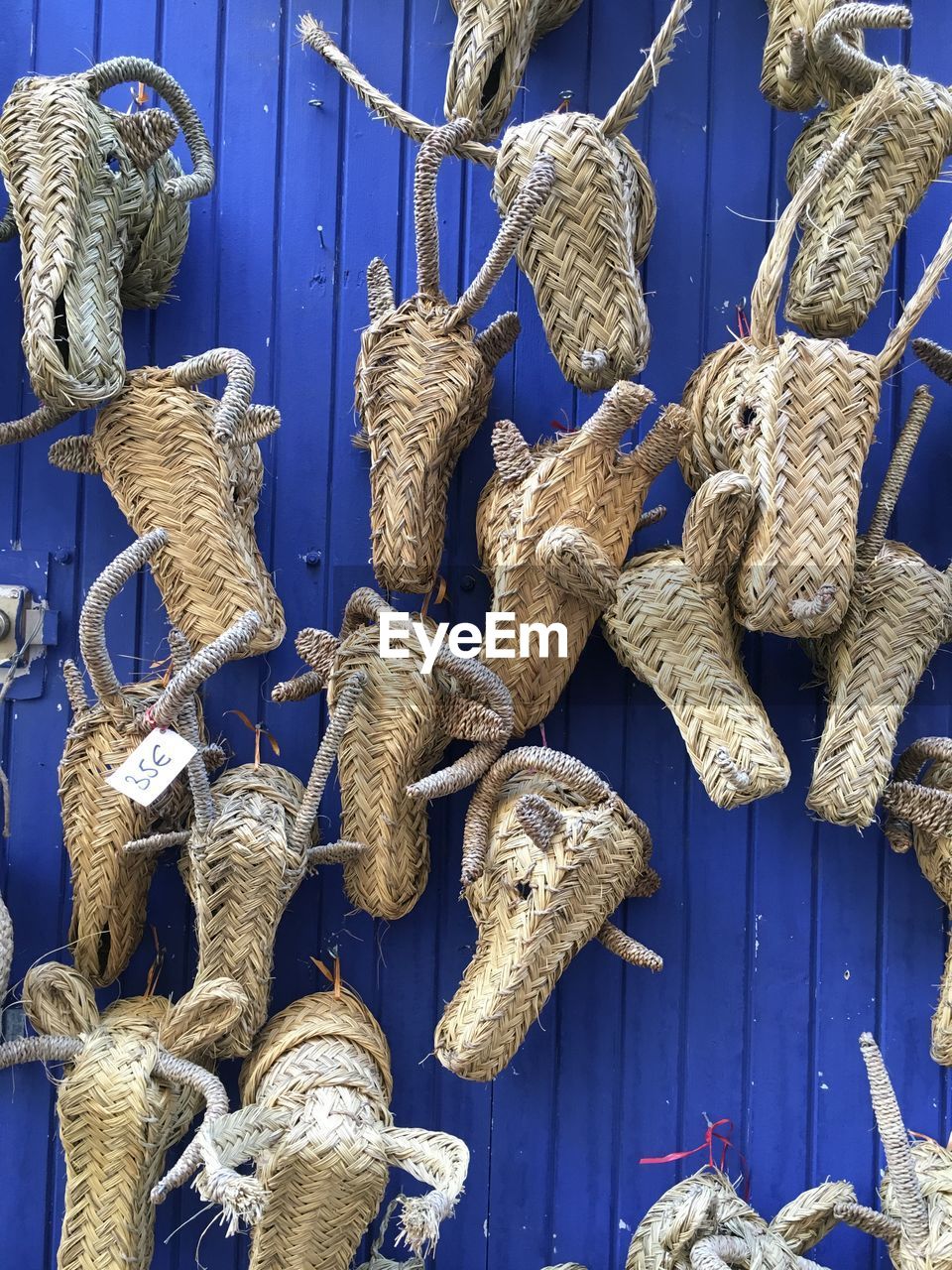 CLOSE-UP OF CLOTHES HANGING ON ROPE