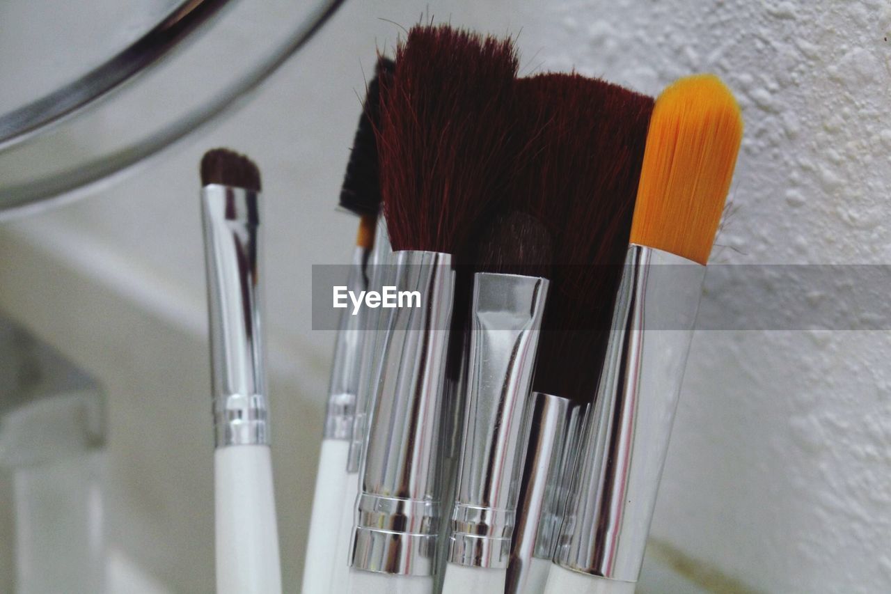 Close-up of make-up brushes at home