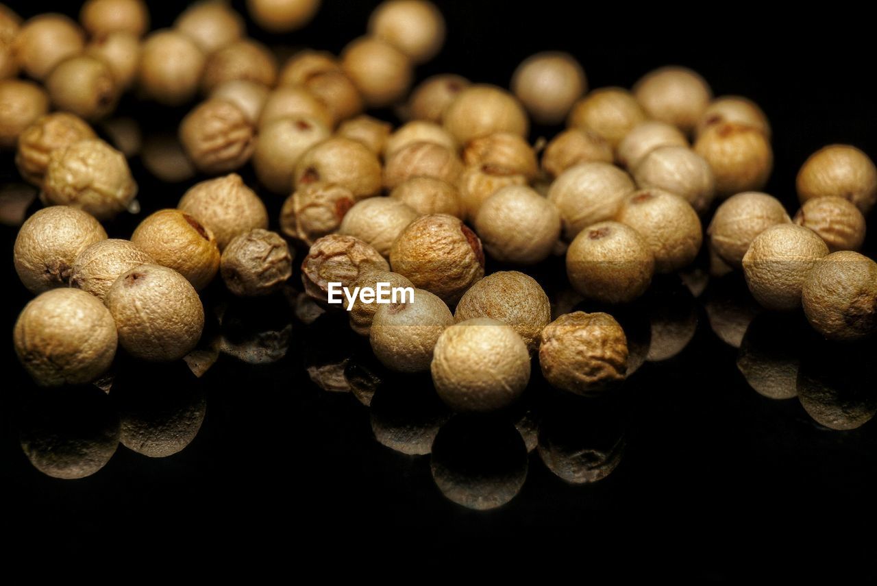 High angle view of pepper against black background