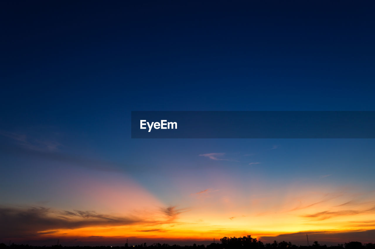 LOW ANGLE VIEW OF CLOUDY SKY DURING SUNSET