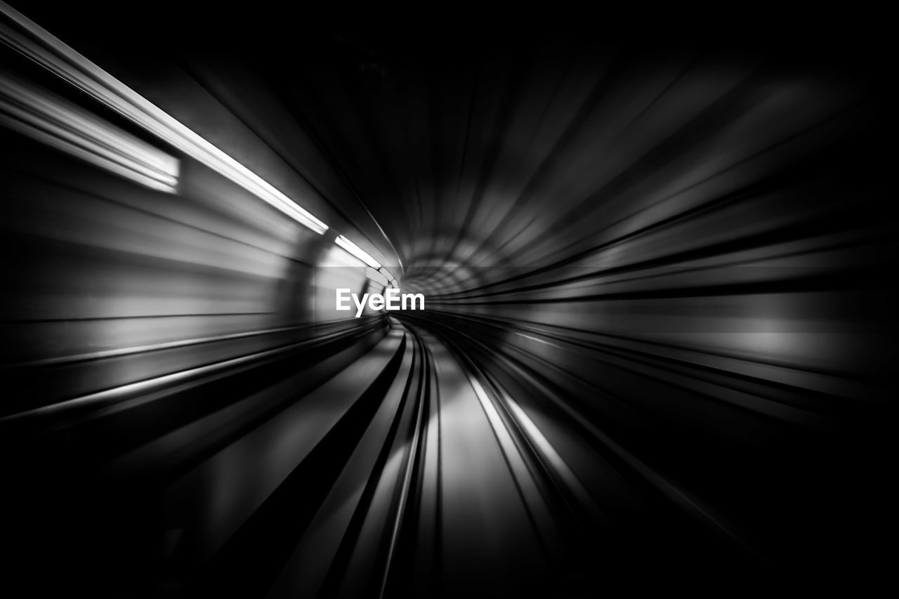 Blurred motion of subway train in tunnel