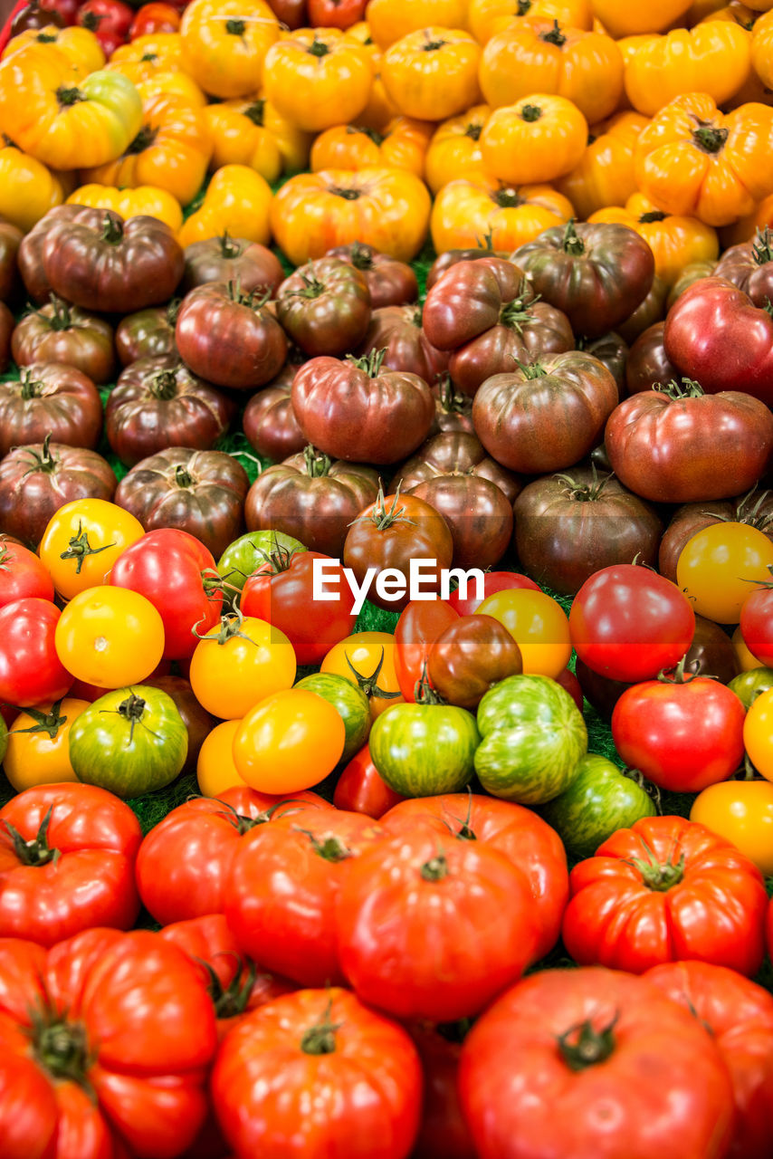 High angle view of tomatoes for sale at market stall