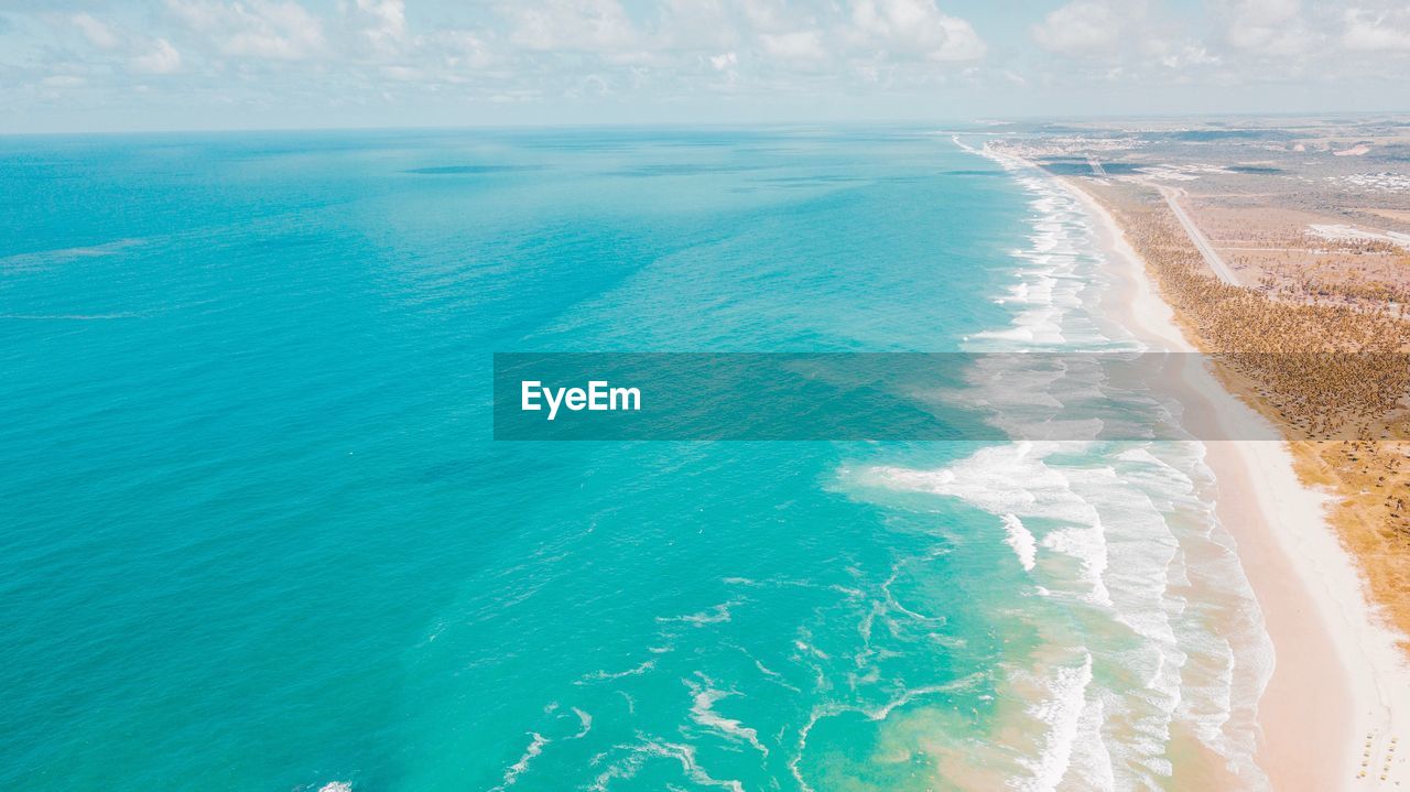 Aerial view of sea against sky