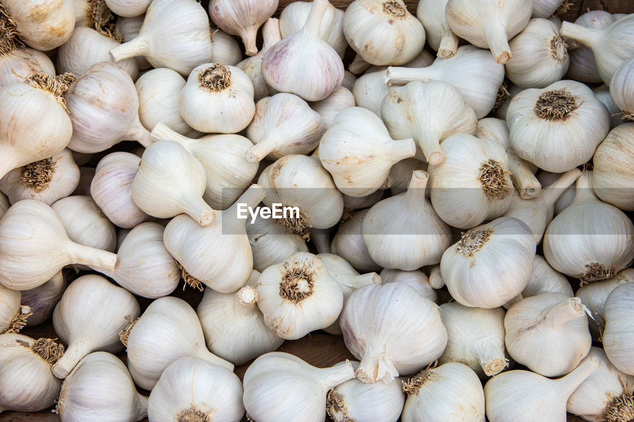Full frame shot of garlic in market