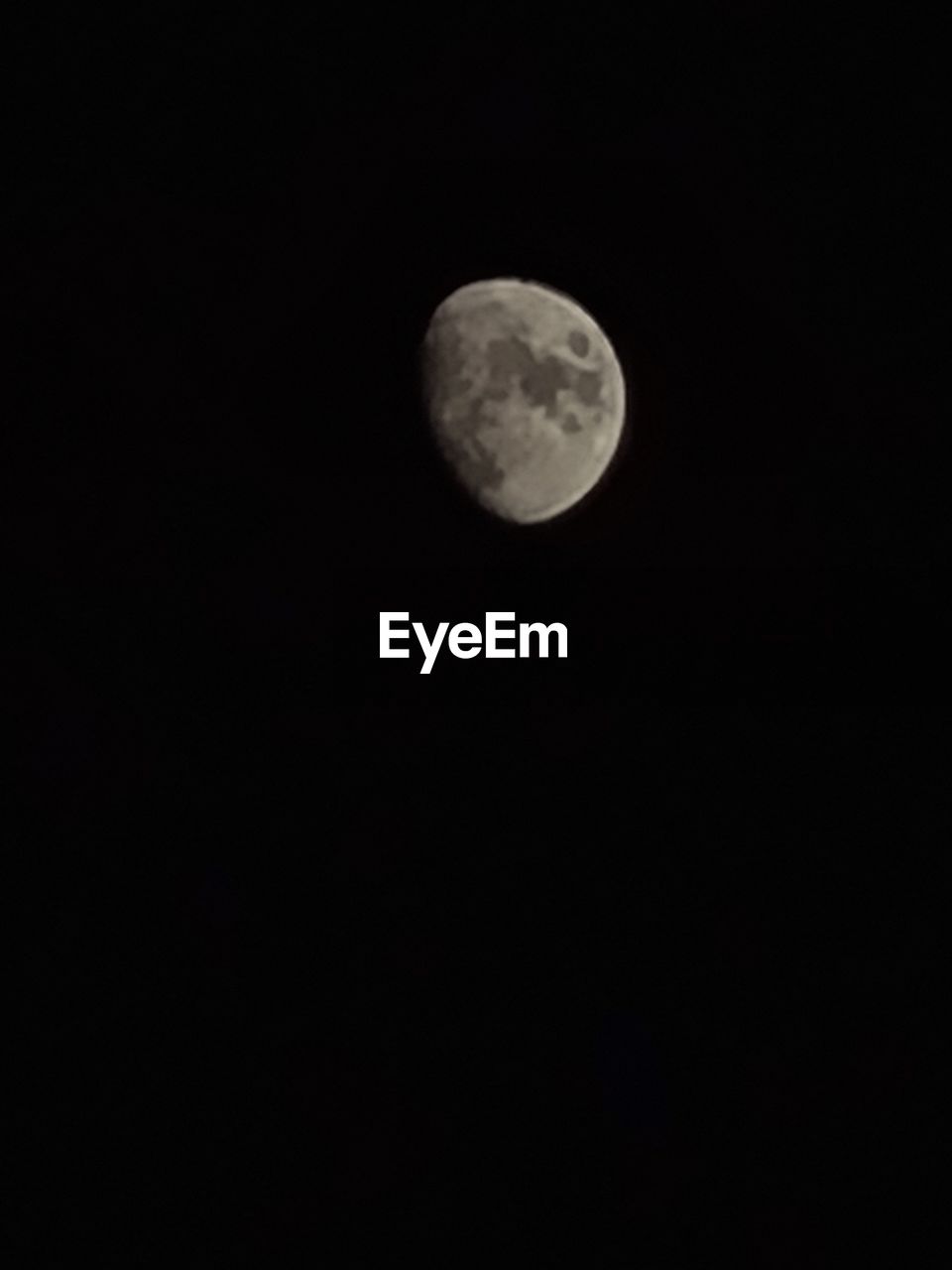 LOW ANGLE VIEW OF MOON AGAINST SKY