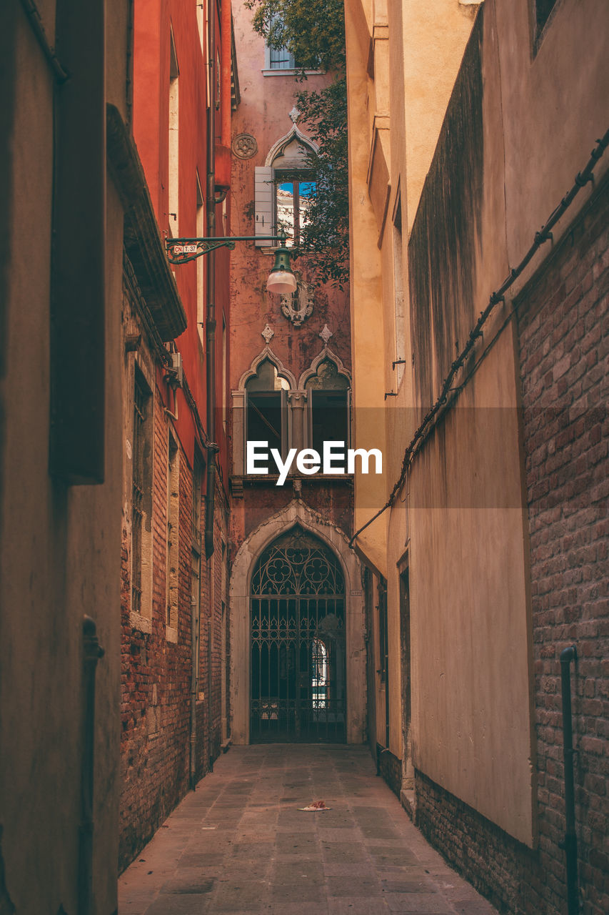 Narrow alley along buildings