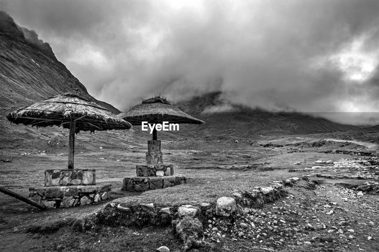 Scenic view of sea against storm clouds