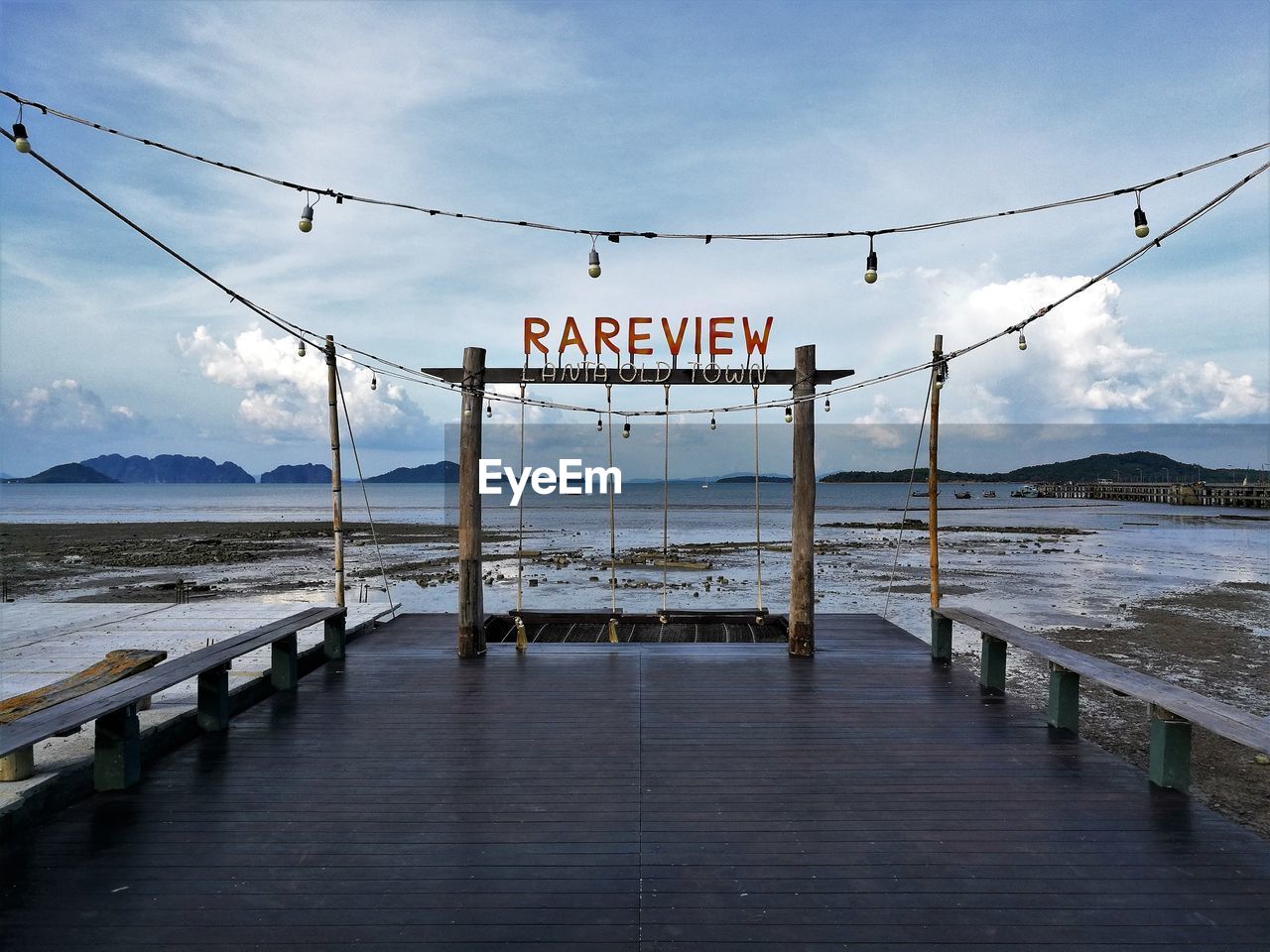 View of the andaman sea from a pier in krabi old town, thailand