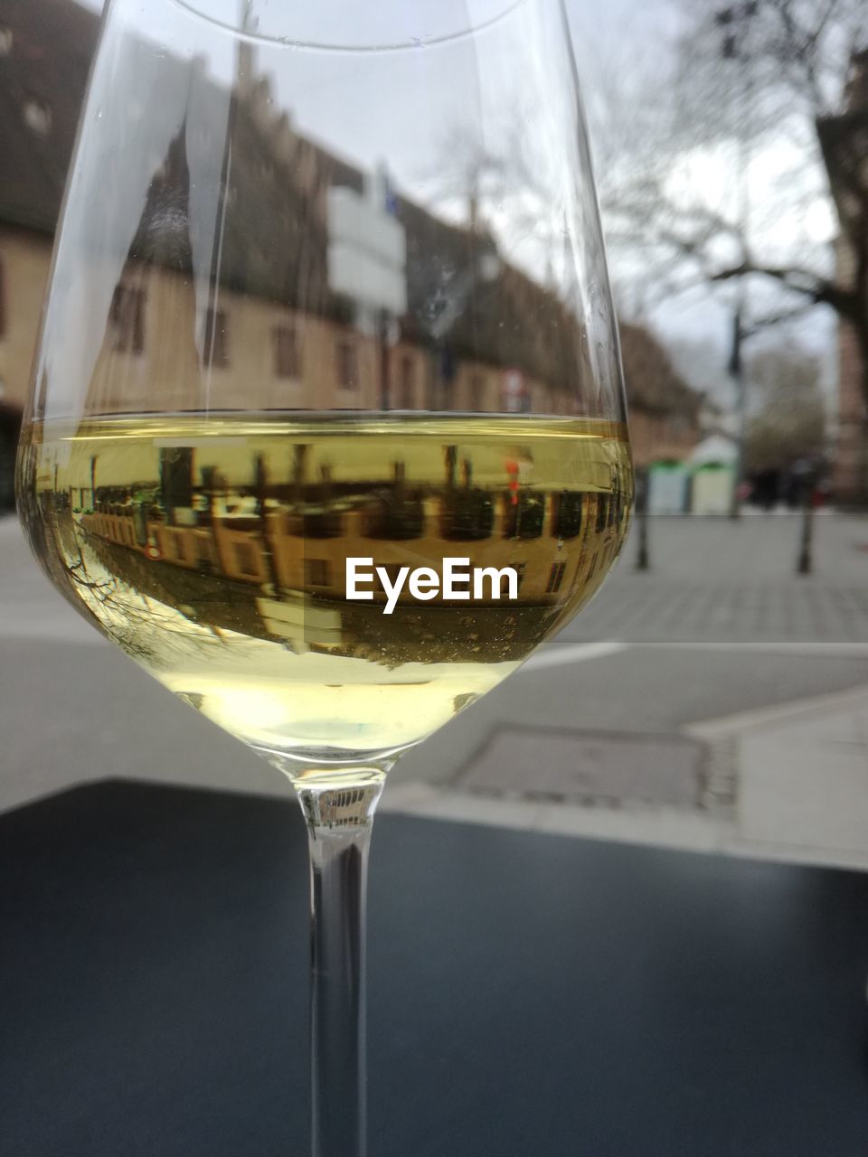 CLOSE-UP OF WINEGLASS ON TABLE