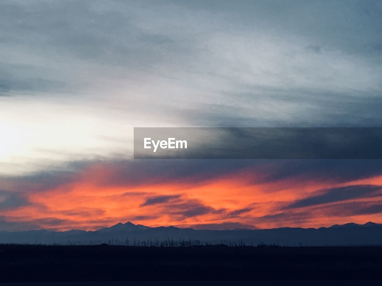 SCENIC VIEW OF SILHOUETTE LANDSCAPE AGAINST SKY