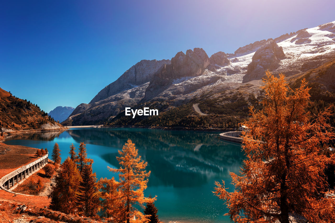 Scenic view of lake against sky during autumn