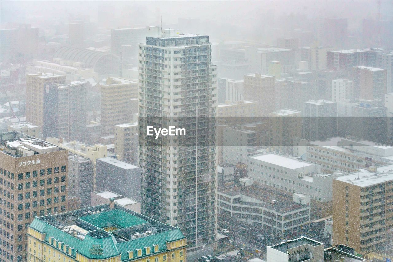 Aerial view of cityscape during winter