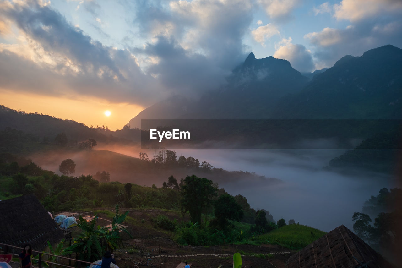 Panoramic view of mountains against sky during sunset