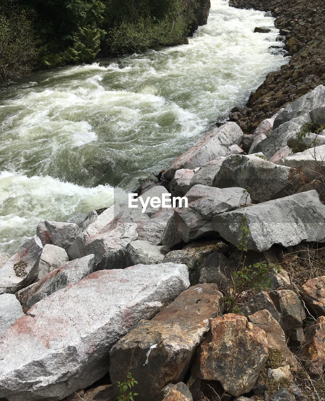 ROCKS BY RIVER