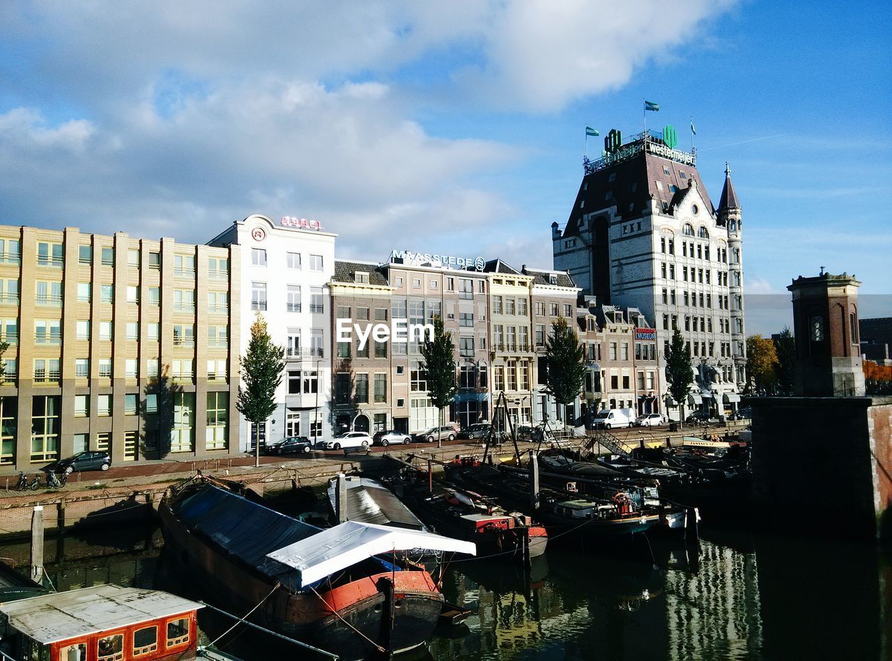 BUILDINGS IN CITY AGAINST SKY