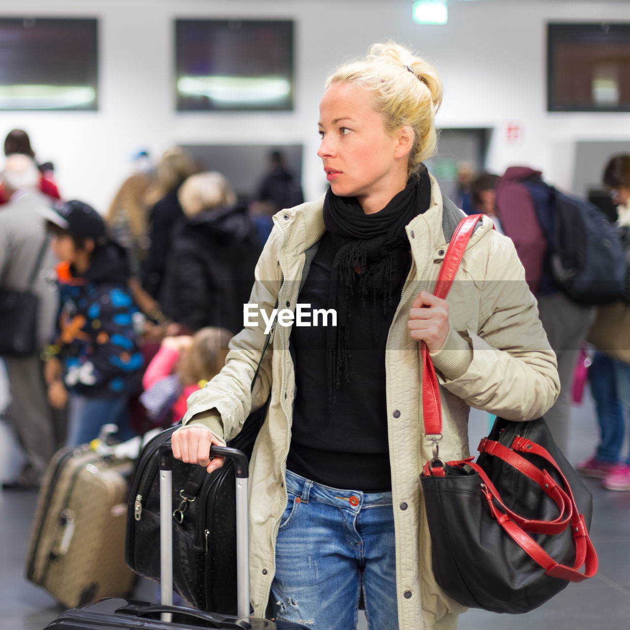 Beautiful woman standing at airport