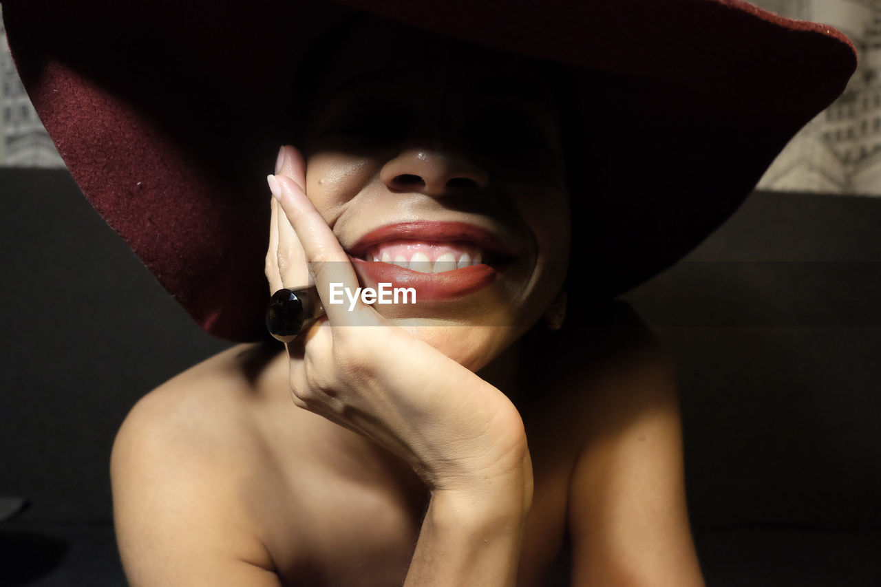 Smiling woman wearing hat