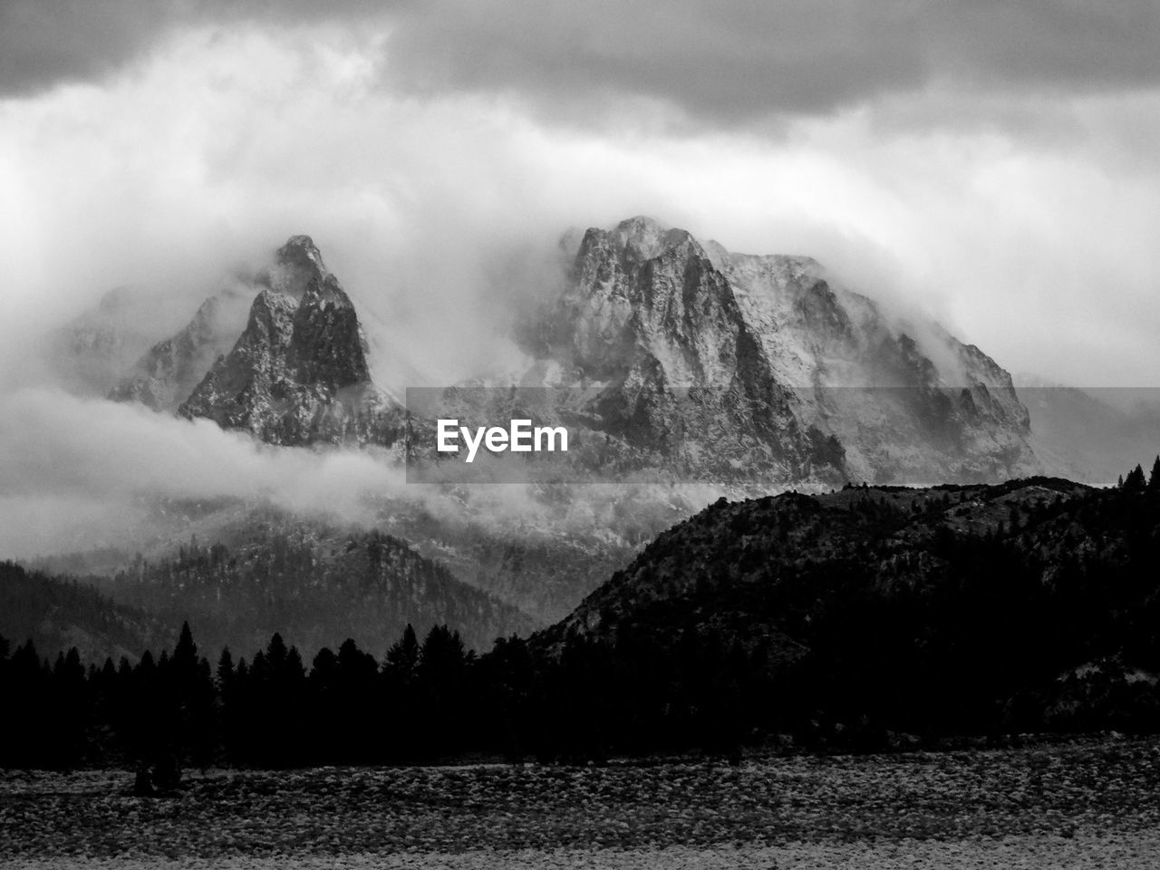 Beautiful cloud formations around mountain peaks