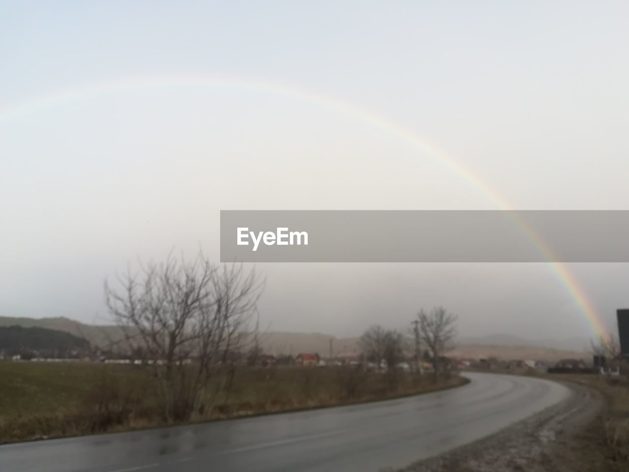 SCENIC VIEW OF RAINBOW AGAINST SKY