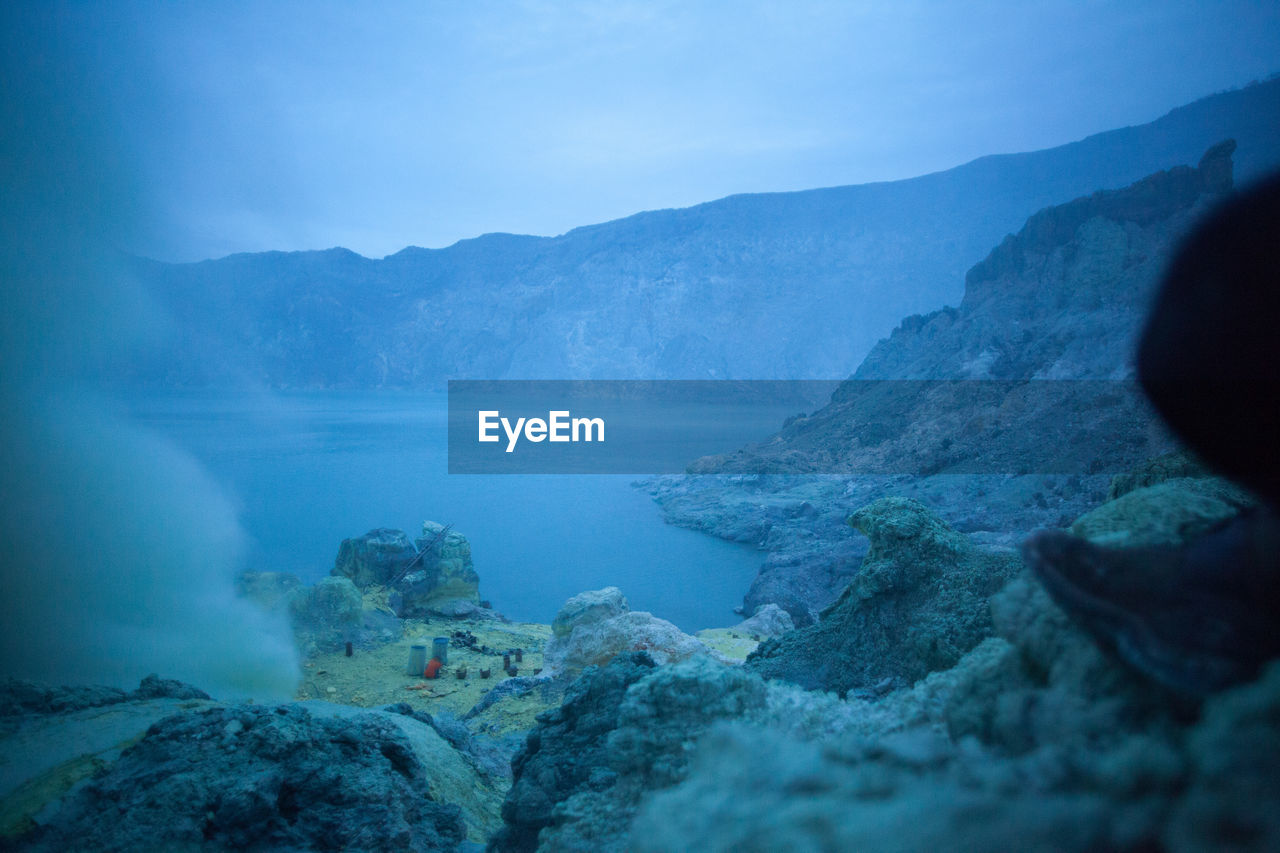 Smoke emitting from volcanic mountain