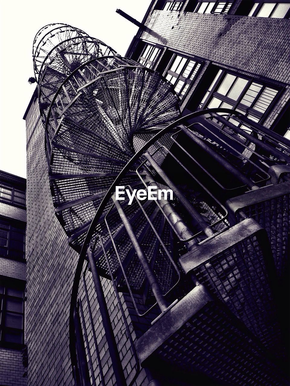 Low angle view of spiral staircase on building