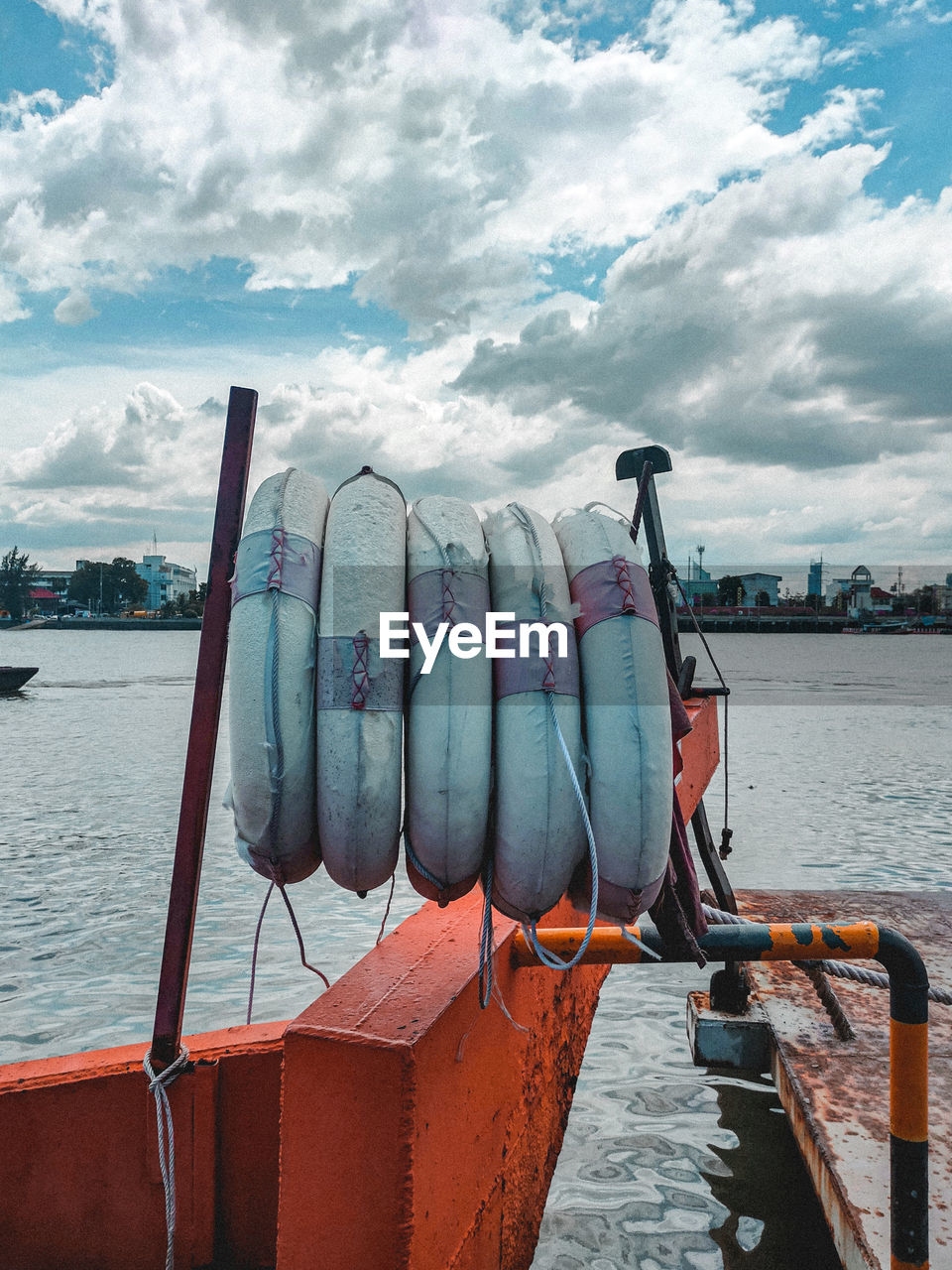 water, sky, cloud, transportation, nautical vessel, vehicle, boat, sea, nature, mode of transportation, no people, ship, watercraft, day, architecture, outdoors, travel, moored, pier, harbor, travel destinations, sailing, blue, beach