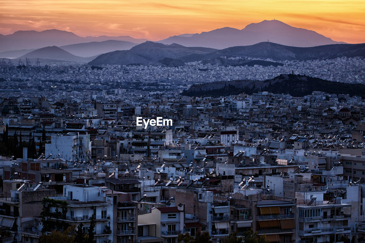 High angle view of townscape against sky during sunset