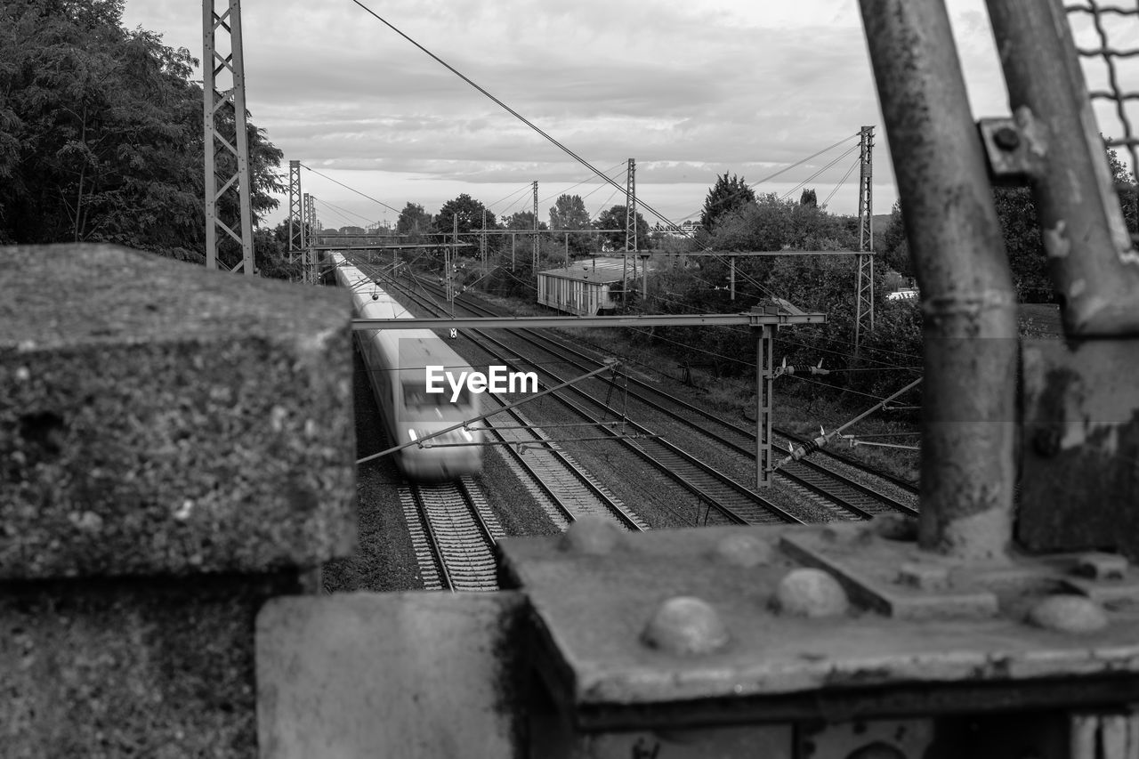 RAILROAD TRACKS AGAINST SKY