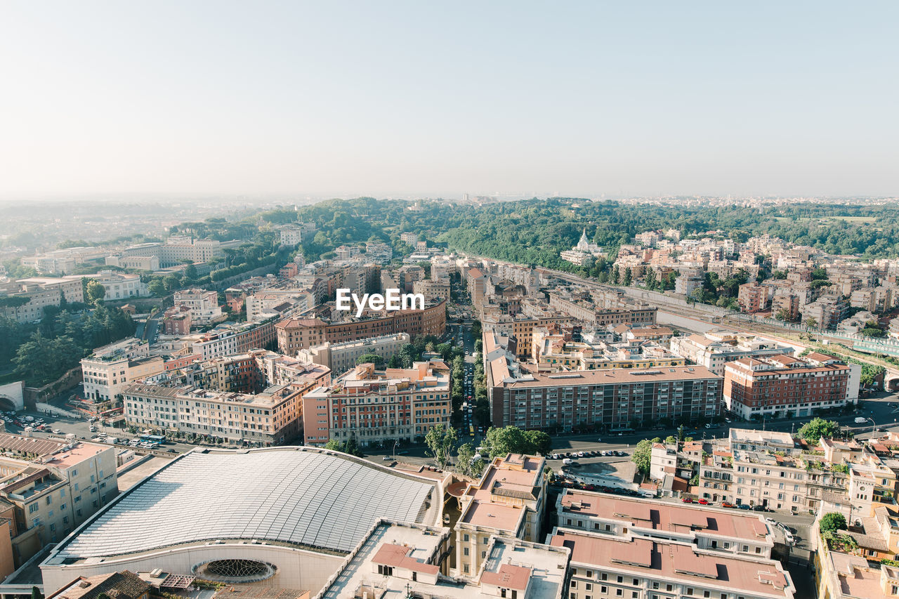 HIGH ANGLE SHOT OF TOWNSCAPE AGAINST CLEAR SKY