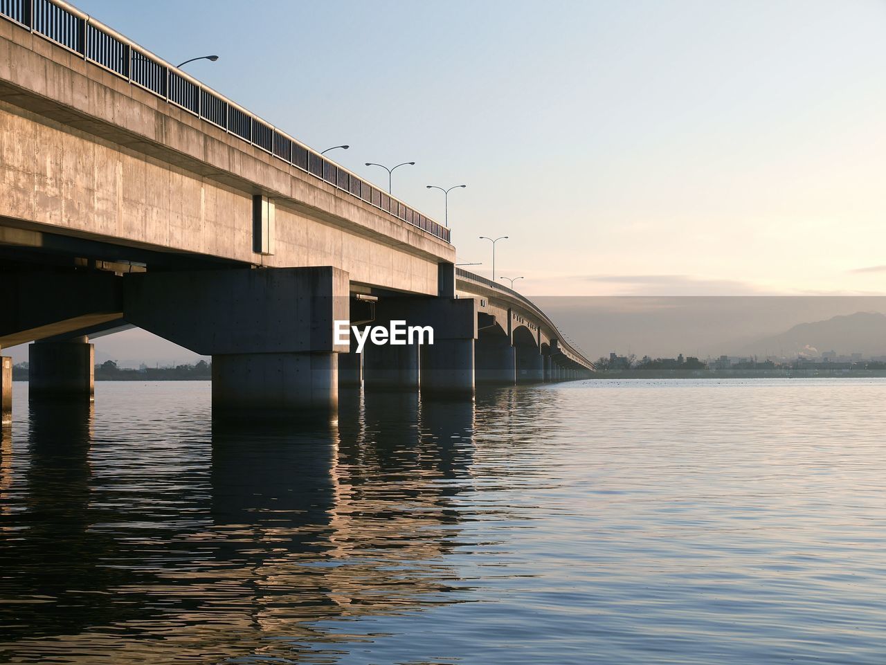 Bridge over river against sky