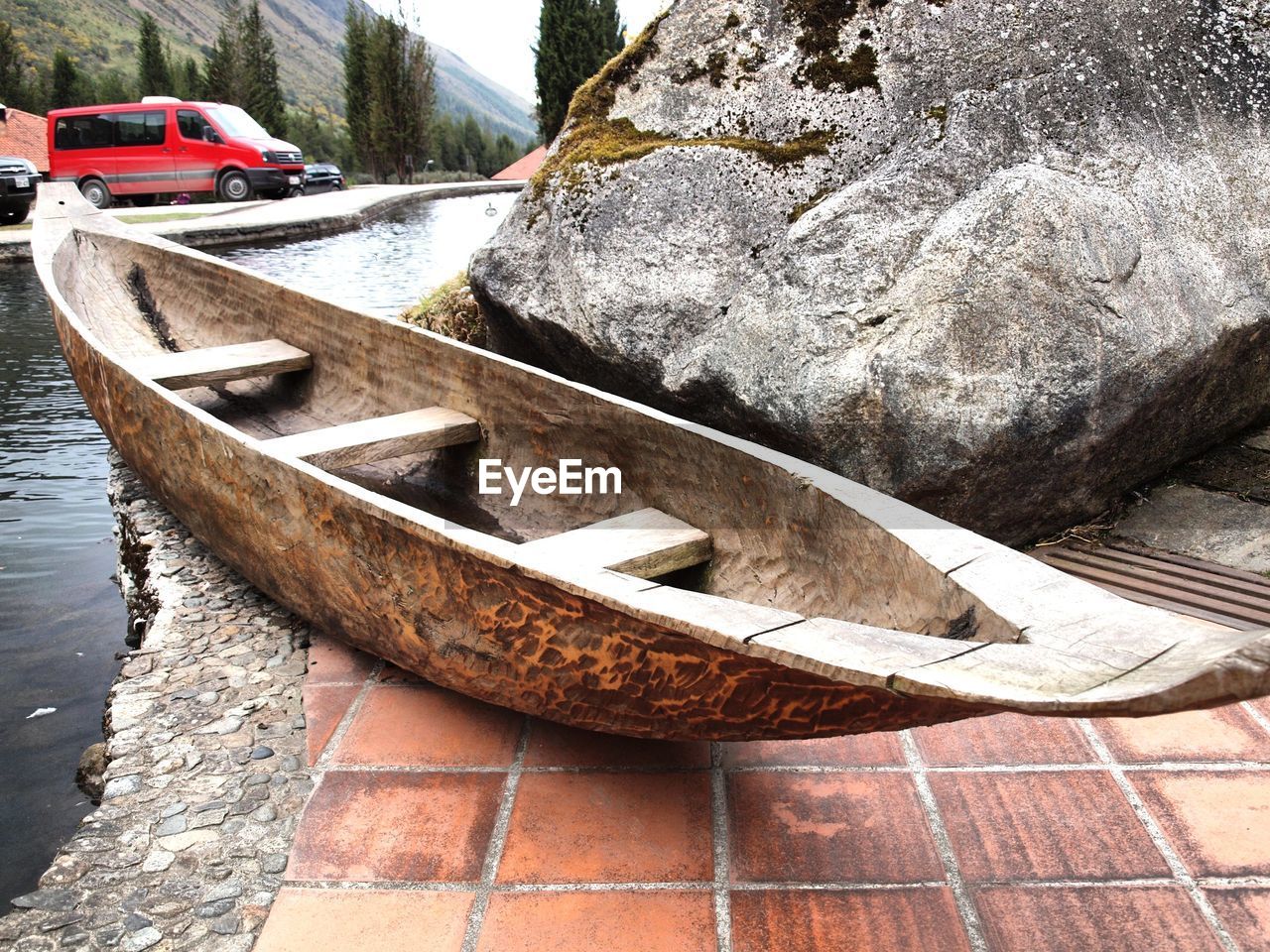 CLOSE-UP OF NAUTICAL VESSEL ON ROCK