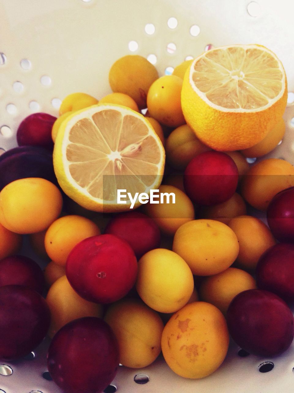 Close-up of fruits in colander