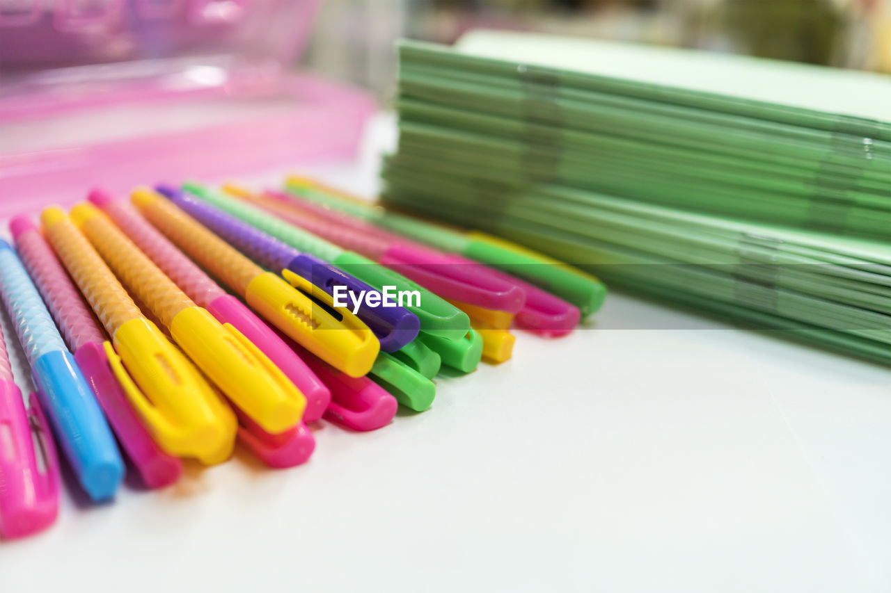 Close-up of colorful felt tip pens on table