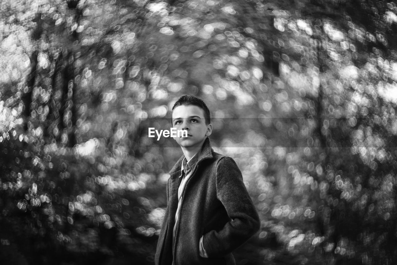 portrait of young man standing outdoors