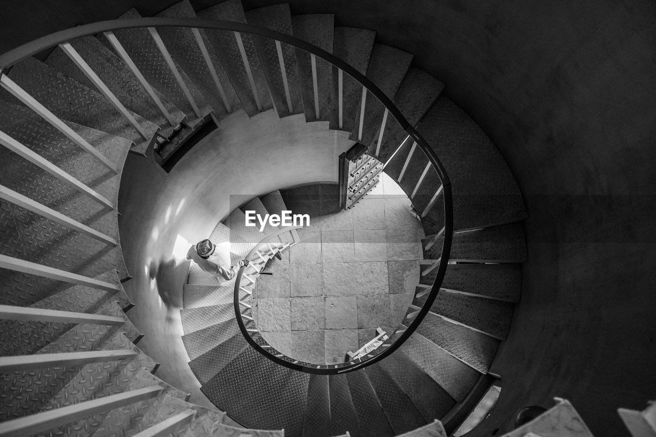 DIRECTLY BELOW VIEW OF SPIRAL STAIRCASE