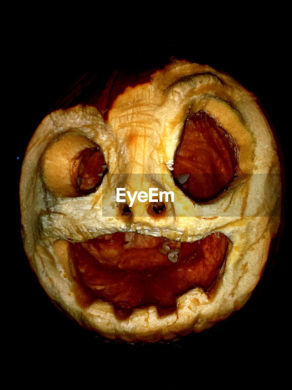 High angle view of carved pumpkin on table