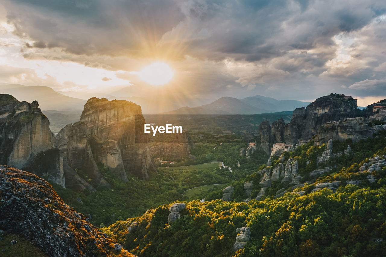 Scenic view of mountains against sky during sunset